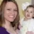 a happy woman with her baby